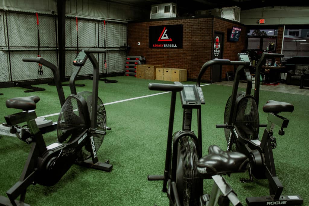Legacy Barbell Exercise Bikes with Rope pulls and step blocks in background