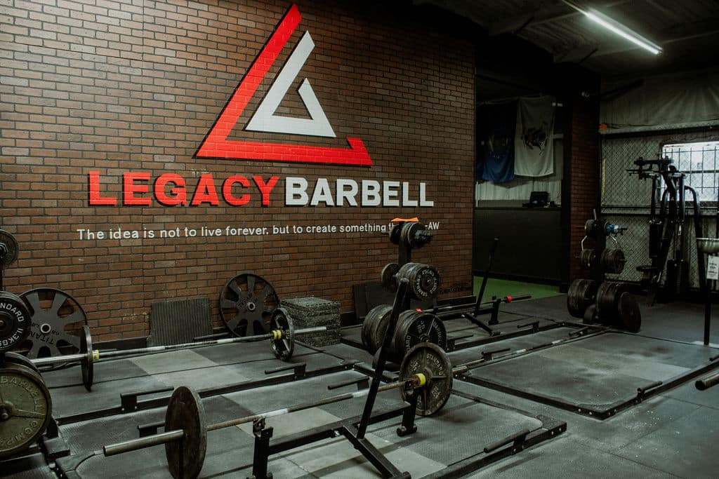Legacy Barbell Sign Back Wall with Weights